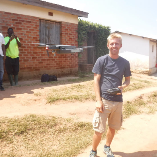 Kevin at Lusangazi farm with drone